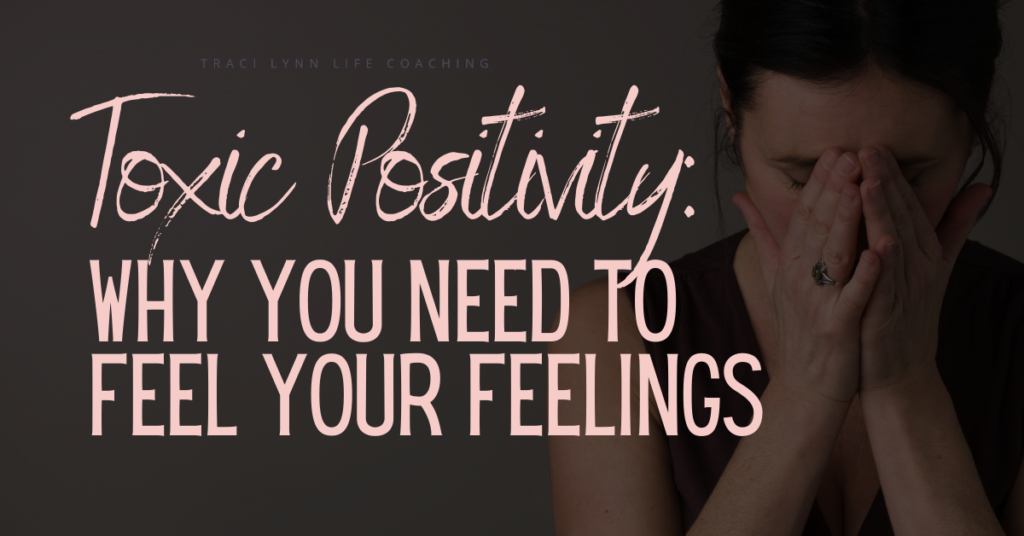 Woman in her 40's holding her face in her hands with the text Toxic Positivity: Why You Need to Feel Your Feelings to the side of her. 