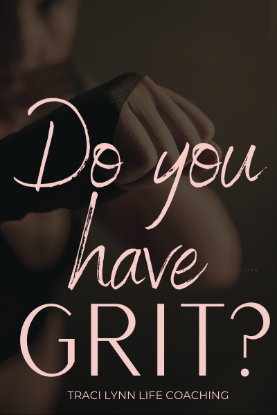Woman punching at the words Do you have grit?